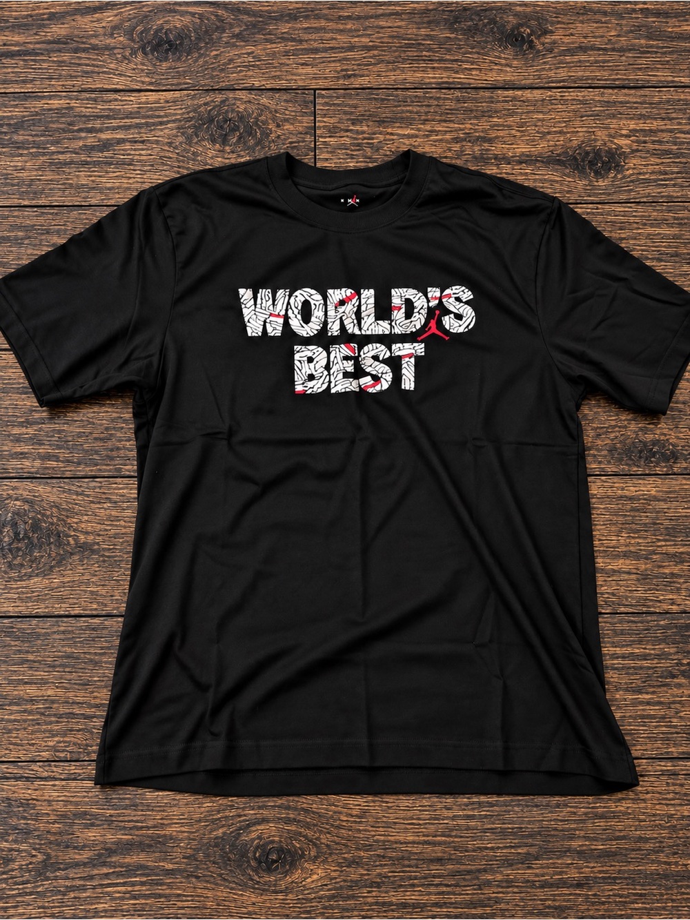 Jordan Men's Black Short-Sleeve Tee with White and Red 'WORLD'S BEST' Graphic